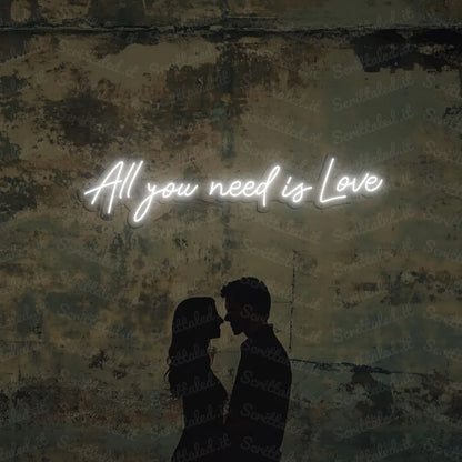 scritta neon all you need is love colore bianco caldo