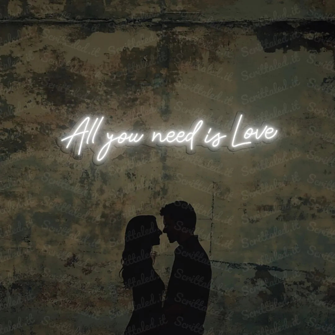 scritta neon all you need is love colore bianco freddo